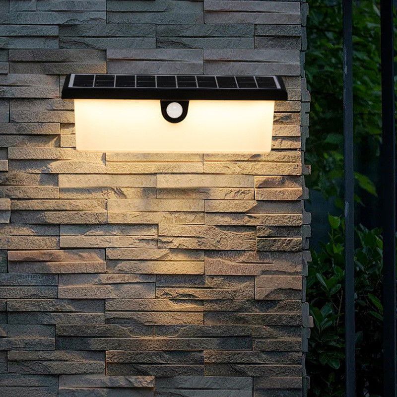 Lâmpada solar de parede à prova d'água Sensor de movimento LED exterior Lâmpada de decoração para parede de jardim